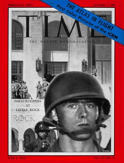 TIME magazine cover from October 7, 1957, featuring a helmeted paratrooper in front of Little Rock Central High School, with troops in background.