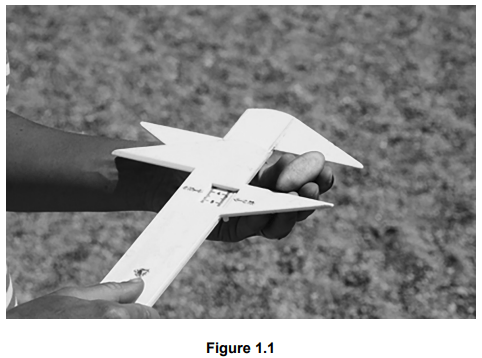 A person measures the length of a pebble using a set of adjustable callipers.