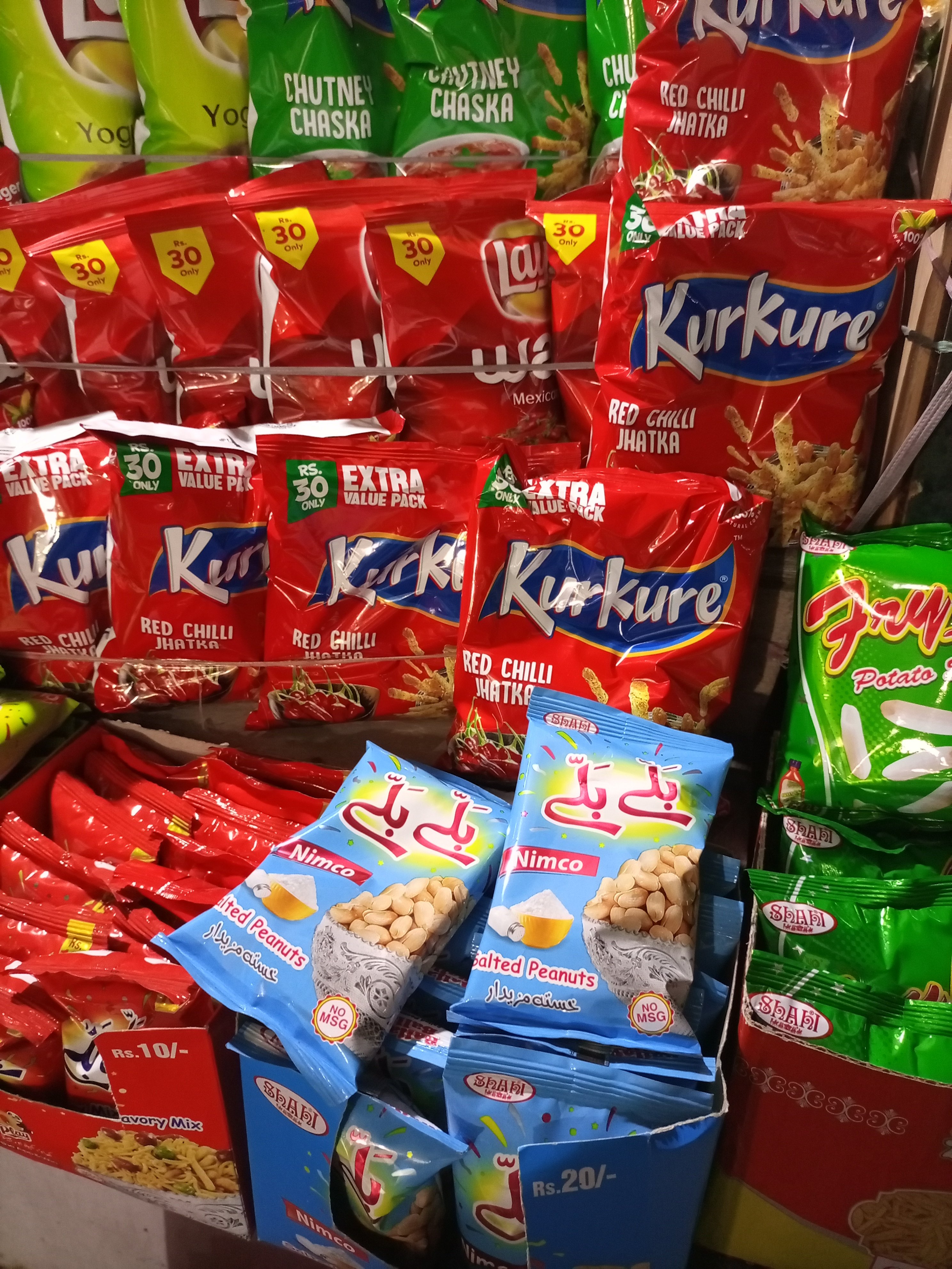 Kurkure snack bags in Red Chilli matka flavour