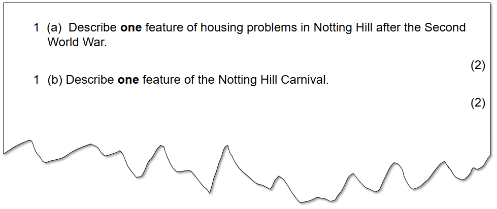 Test paper excerpt with two questions: 1 (a) asks to describe one feature of housing problems in Notting Hill after the Second World War, and 1 (b) asks to describe one feature of the Notting Hill Carnival. Each question is worth two marks.