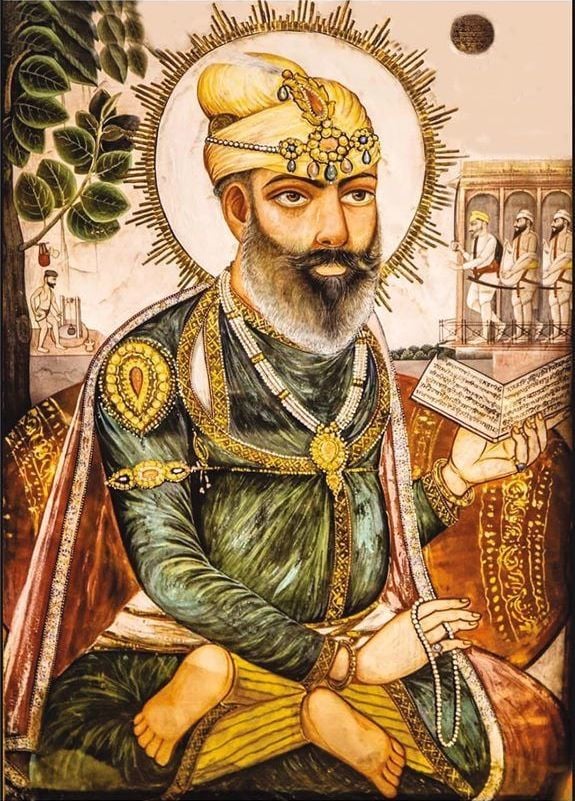 A historical figure in a royal robe, holding a book, with a halo and ornate jewellery, sitting under a tree with figures in the background.