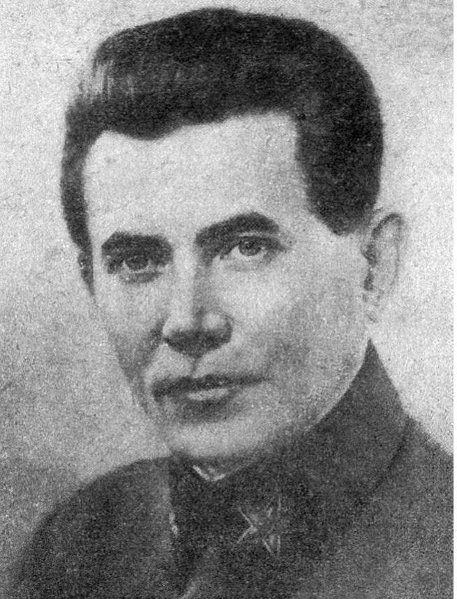 Black and white portrait of a man in a military uniform, with short dark hair and a neutral expression, facing slightly to the left.