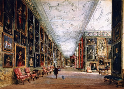 An opulent gallery with ornate ceiling, lined with large framed paintings and red velvet chairs. A person and a dog walk down the corridor.
