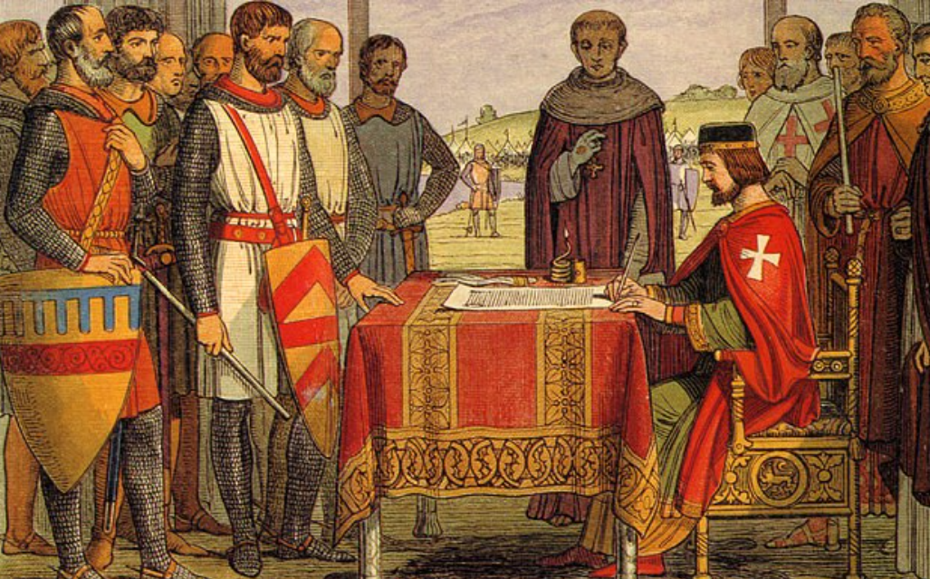 A medieval king sits, writing, surrounded by noblemen in armour and a monk. A document rests on a decorated table, suggesting a historic signing.