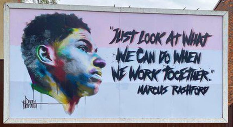 Street art mural of a man with a colourful profile next to text: "Just look at what we can do when we work together." - Marcus Rashford.