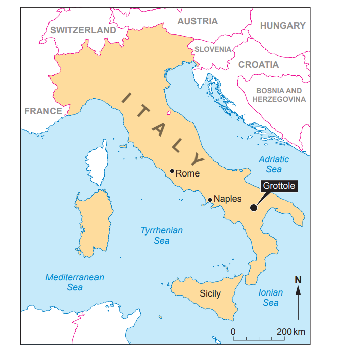 Map highlighting Italy in yellow, showing major cities Rome and Naples. Grottole is marked in the south, bordered by the Mediterranean and Adriatic Seas.