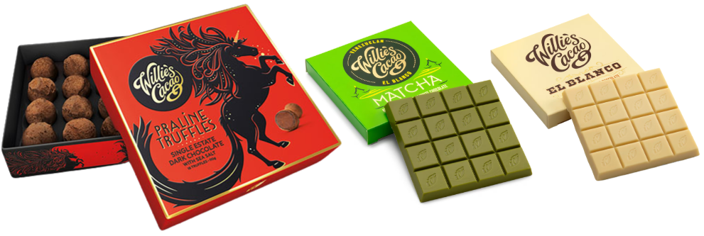 Box of praline truffles and two chocolate bars, one matcha green in a green box, and one white chocolate in a cream-coloured box, all by Willie’s Cacao.