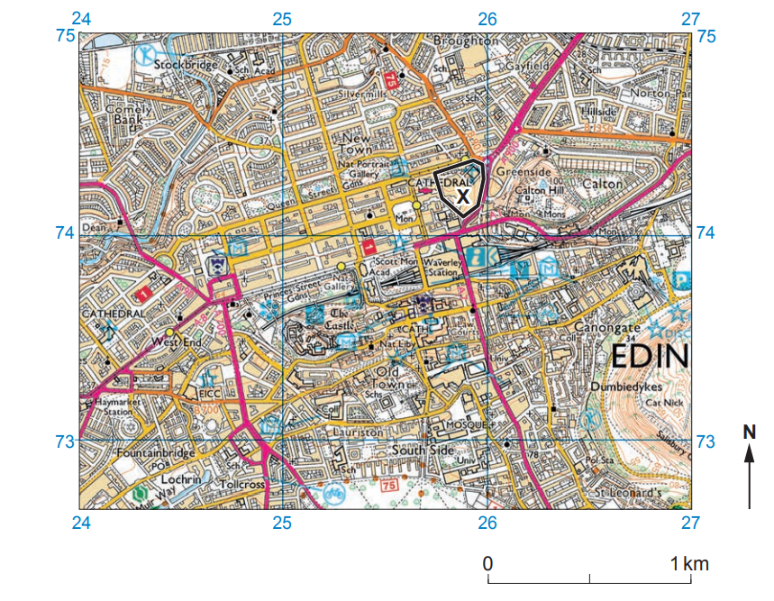 Detailed map of Edinburgh city centre with roads, rail lines, and landmarks, including Waverley Station and Edinburgh Castle. Scale and compass included.