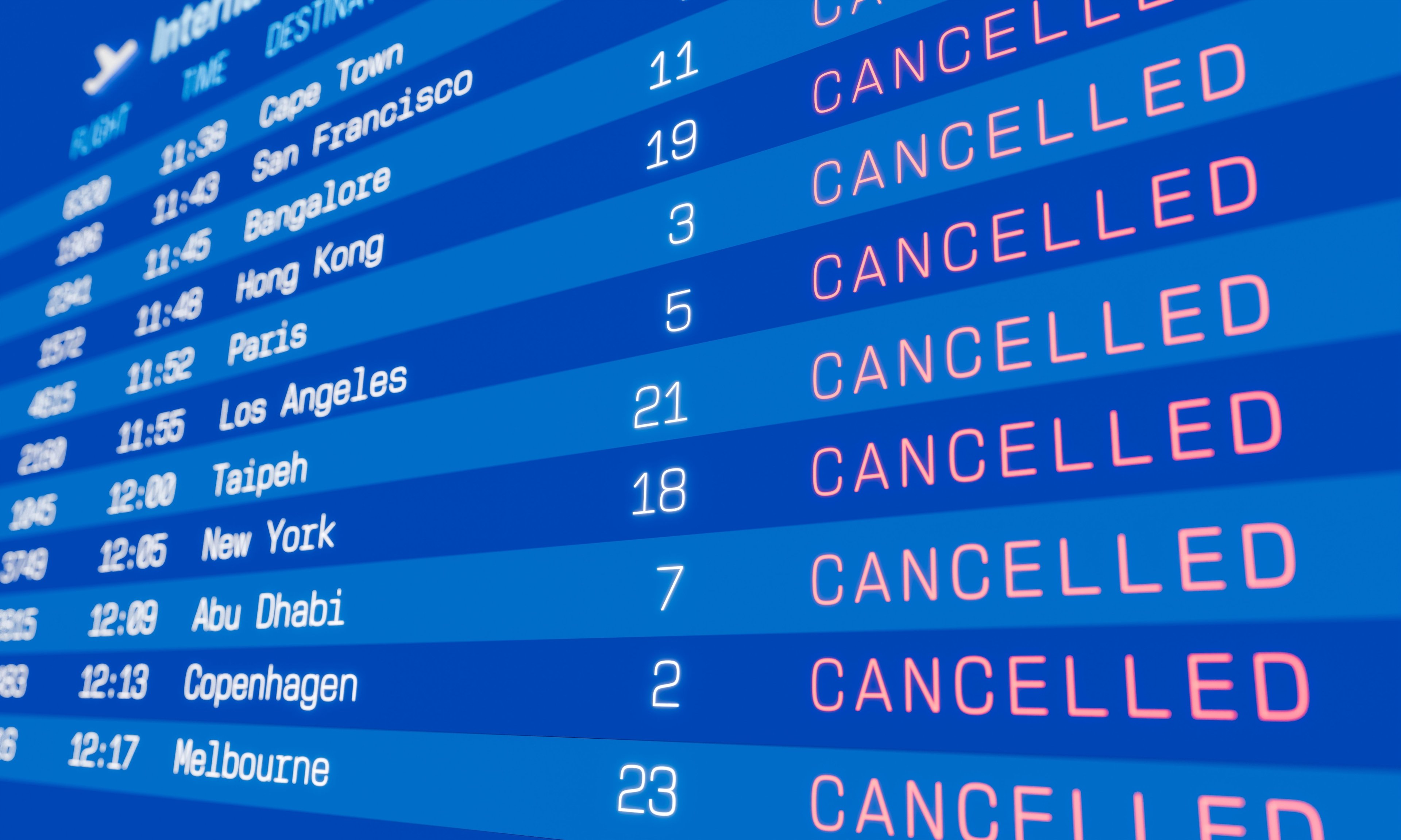 A flights information board showing all departures cancelled