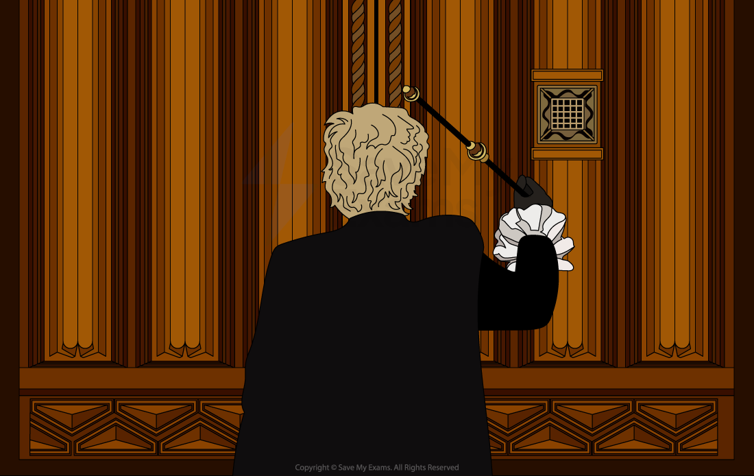 A person in formal attire with white ruffled cuffs knocks on a large ornate wooden door using a black staff.