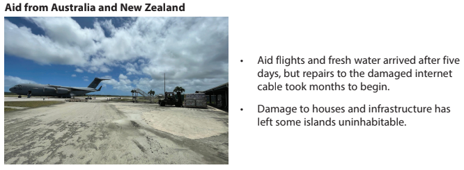 Military transport aircraft parked on a tropical airstrip under a cloudy sky, with aid supplies being unloaded for disaster relief efforts.