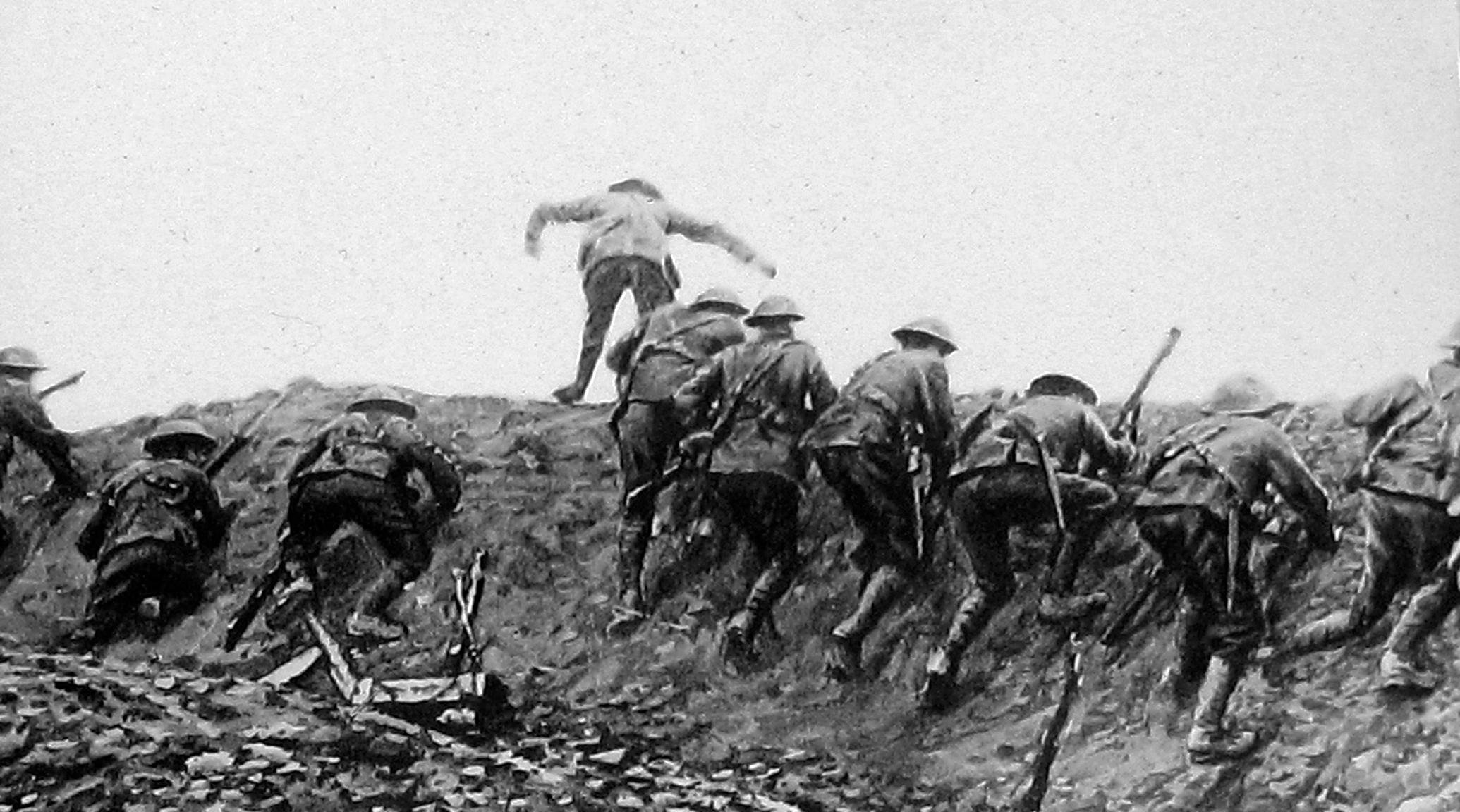Soldiers in World War I uniforms charge over a trench, carrying rifles, with one leading the way, highlighting the frontline battle experience.