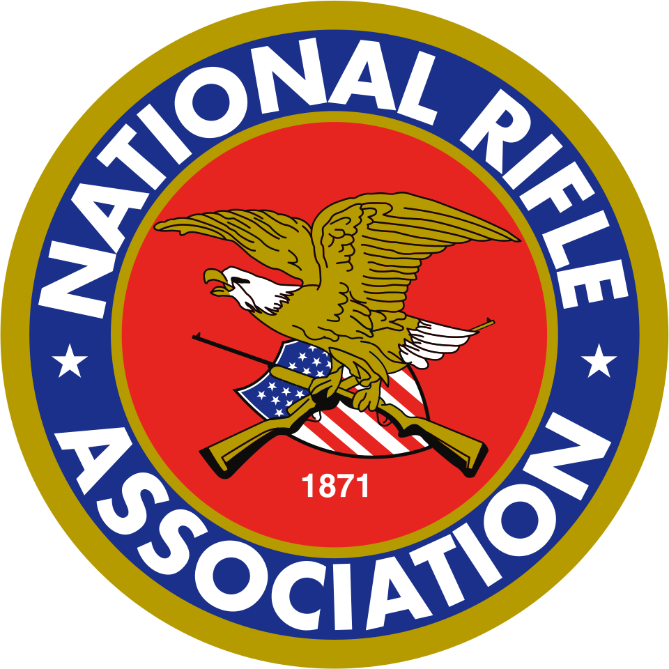 Circular logo featuring an eagle perched on crossed rifles over a shield with stars and stripes, surrounded by the text "National Rifle Association."