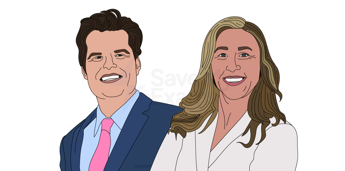 Man in suit and woman in sleeveless checked dress walk together in a professional setting, carrying documents and looking ahead.