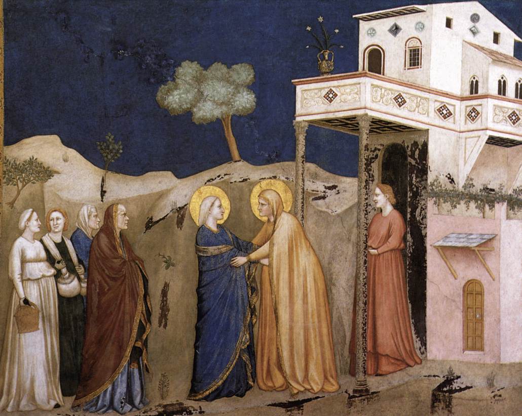 A medieval fresco depicts a meeting of two haloed women in blue and orange robes, surrounded by onlookers, set against a landscape and building.