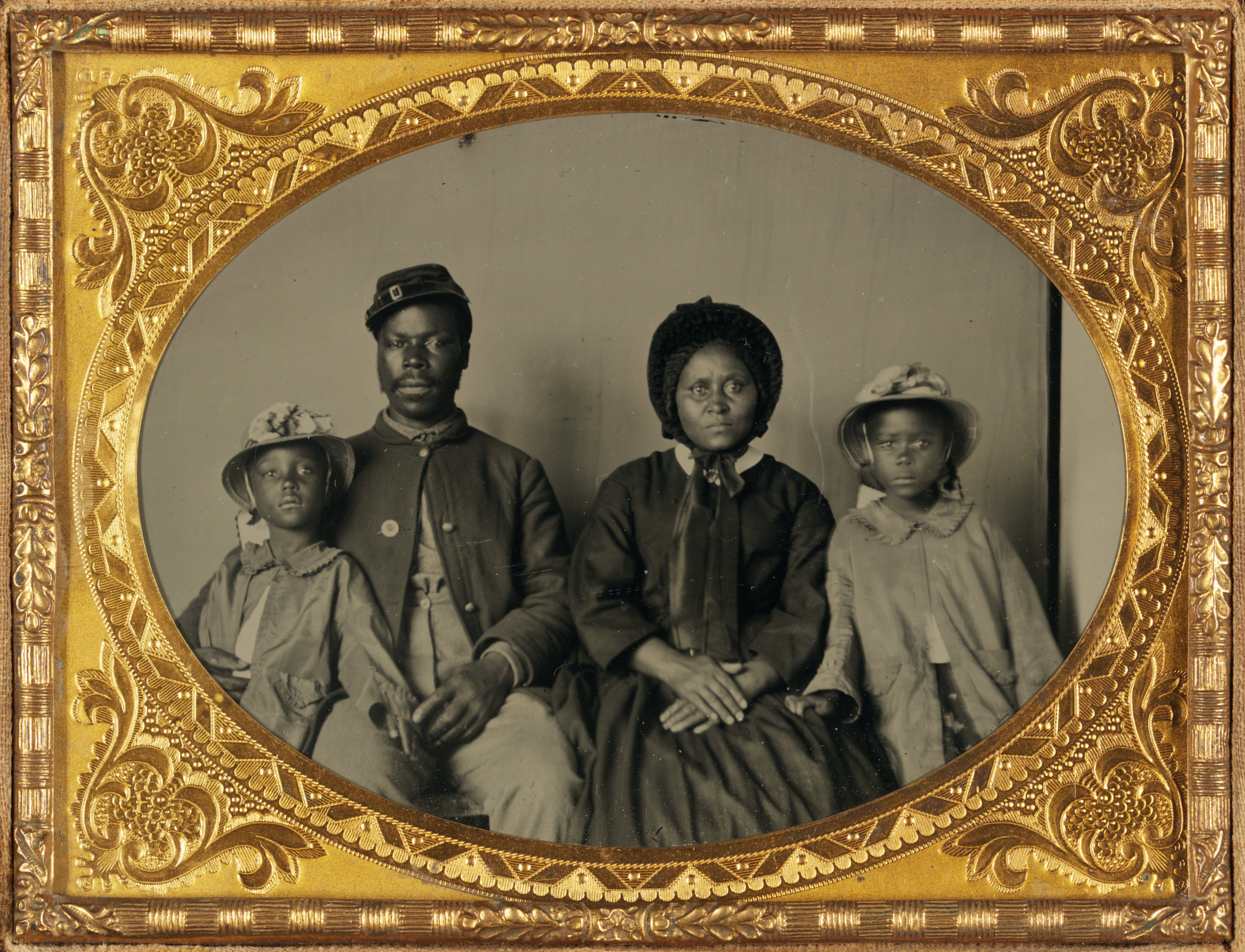 Photograph of an African American Union soldier and their family