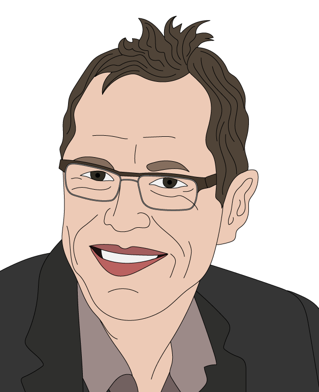 Smiling man with short, spiky hair and glasses, wearing a grey suit and striped shirt, posed against a white background.