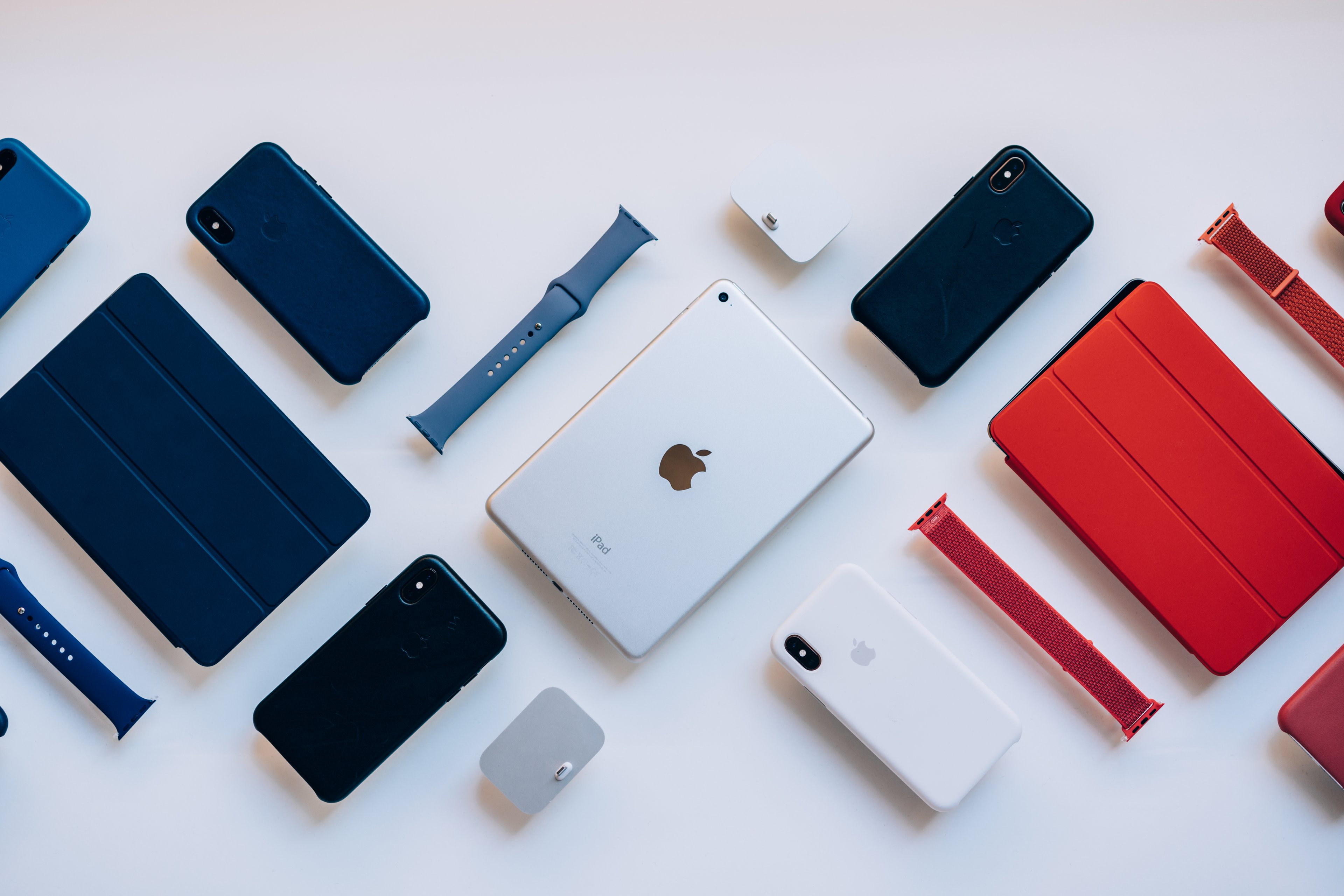 A range of Apple branded products, including smartphones, tablets and smart watches