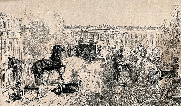 Historical engraving of a bomb attack on a horse-drawn carriage in a city street, with soldiers, smoke, fallen figures and grand classical buildings behind.