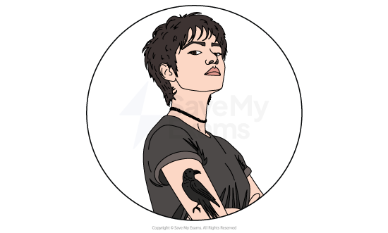 Image of Antigone from Antigone: she is a confident young woman with short dark hair, folded arms, black T‑shirt and a black bird tattoo on their upper arm, in a white circle.