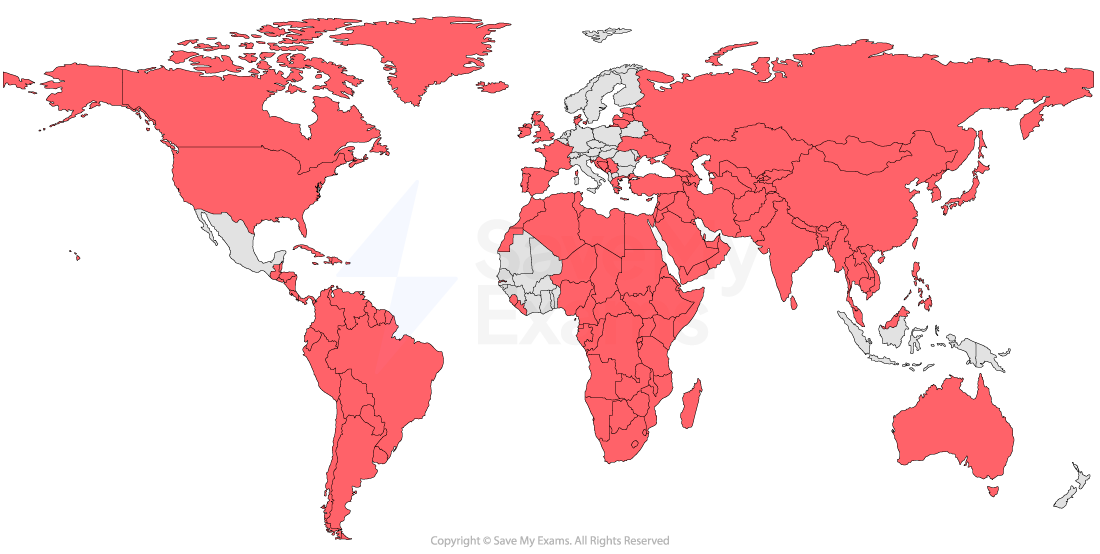 World map with most countries shaded dark red and a few in pale grey, highlighting widespread global coverage with limited unshaded regions.