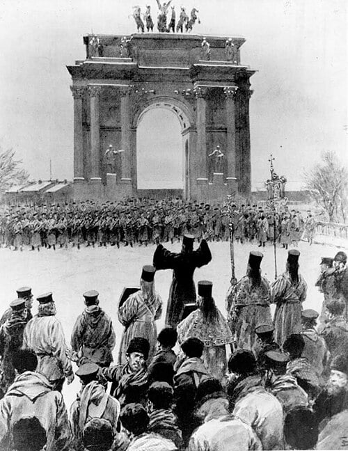 Father Gapon stands with his crowd, Cossacks look on with weapons drawn