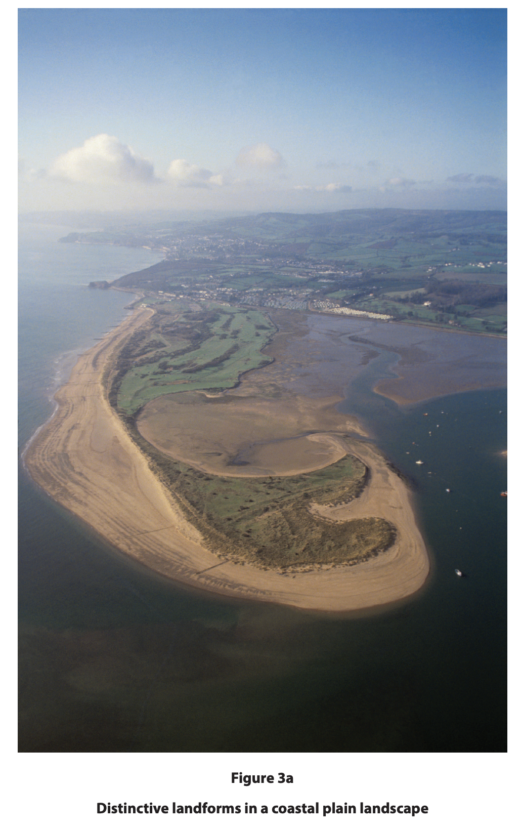 A depositional coastal landform of sand extending out from the main land area.