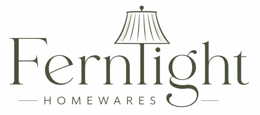 Fernlight Homewares logo with elegant green serif lettering and a stylised lampshade forming the dot and stem of the letter “l” above the word “Homewares”