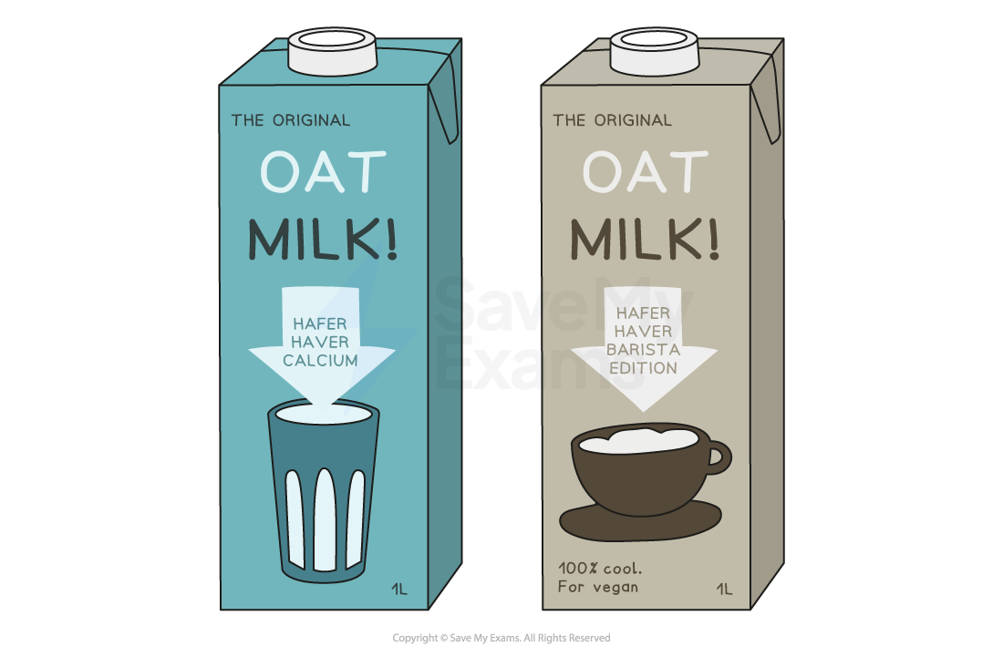 Three Oatly oat drink cartons arranged upright and sideways, showing grey and blue packaging with bold typography and a black coffee cup illustration