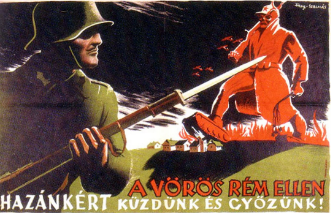 A soldier with a rifle confronts a red, monstrous figure atop burning timber. Hungarian text at bottom promotes fighting against a red menace.